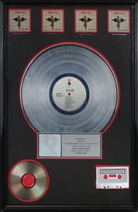 Motley Crue 1989 Dr. Feelgood RIAA Multi Platinum Award Issued To KUPD-FM